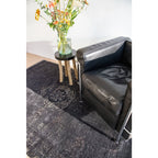 Louis De Poortere Eco Rug Medallion – musta vintage-matto, useita kokoja