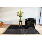 Louis De Poortere Eco Rug Medallion – musta vintage-matto, useita kokoja
